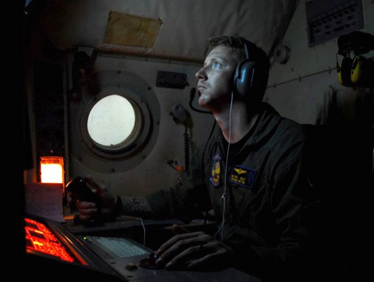 Naval Aircrewman Operator 2nd Class Matthew Bailey of Patrol Squadron Forty on Duty